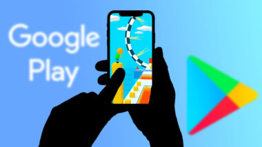 Hands holding a phone, playing a hypercasual game with Google Play logo in the background