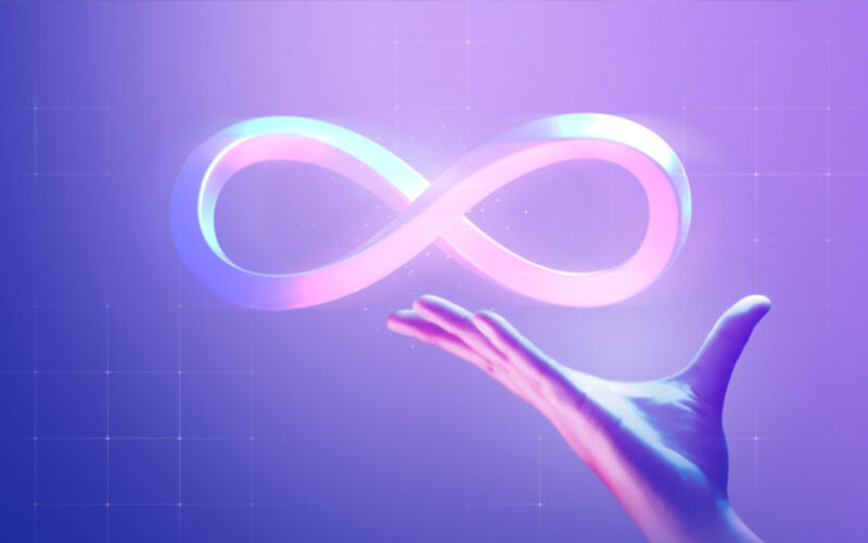 Meta's logo with a virtual hand holding it mid-air