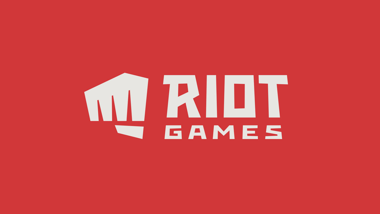 Riot Games logo on a brick red color background