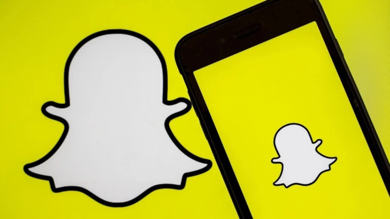 Snap logo on yellow background and phone screen