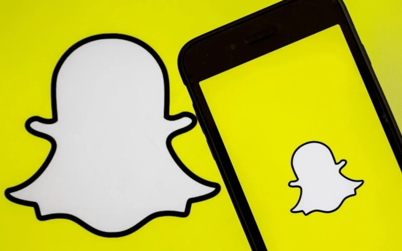 Snap logo on yellow background and phone screen