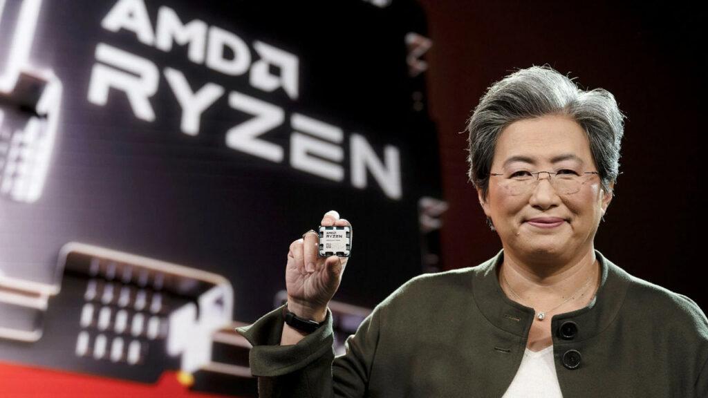 AMD boss Lisa Su holding the new Ryzen 7000 series CPU in her hand