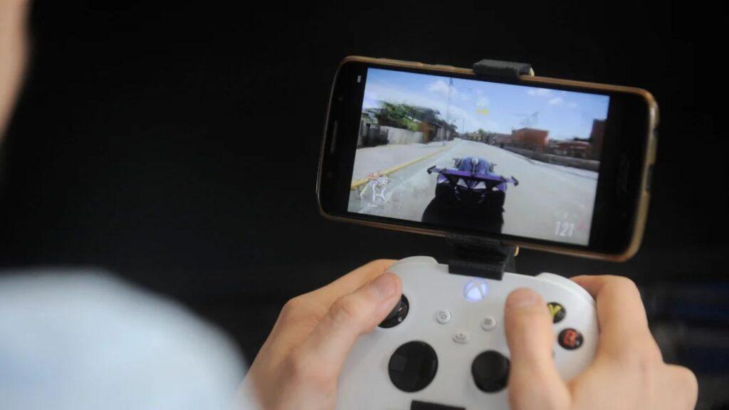 Someone holding a controller.