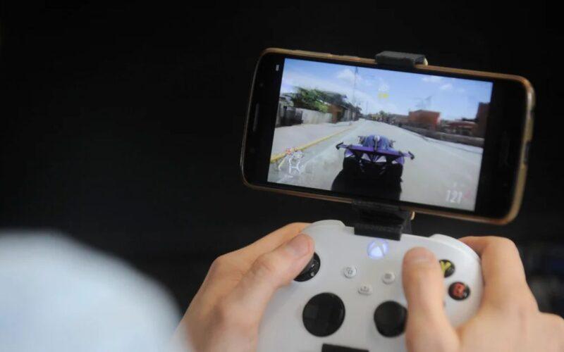 Someone holding a controller.