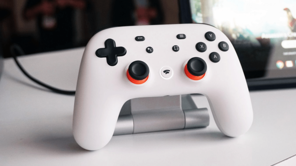Beyaz bir Google Stadia kontrolörü