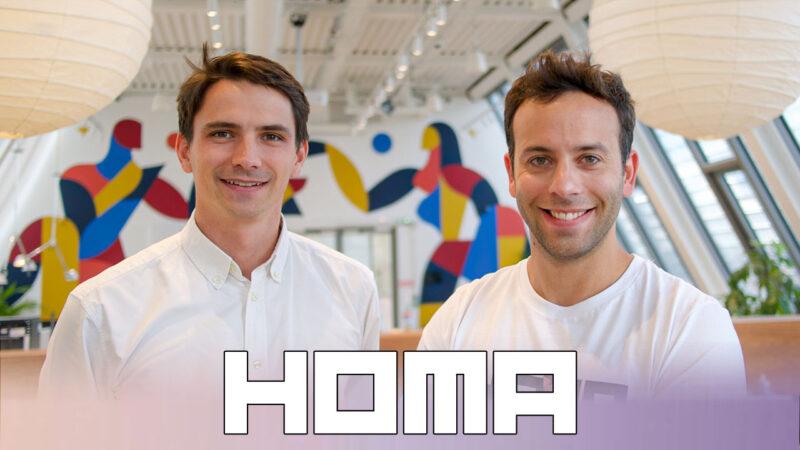 Two Homa founders posing for the camera happily with Homa logo