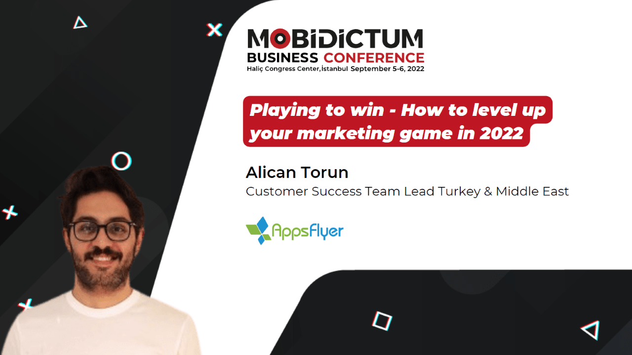 A photo of Alican Torun smiling with the MBC banner in the backgorund