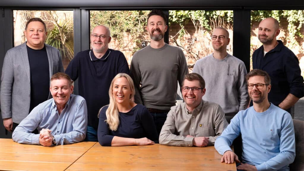 Photo of Lighthouse Games employees with Gavin Raeburn on far left bottom.