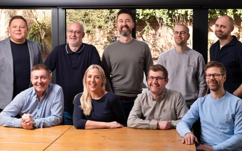Photo of Lighthouse Games employees with Gavin Raeburn on far left bottom.
