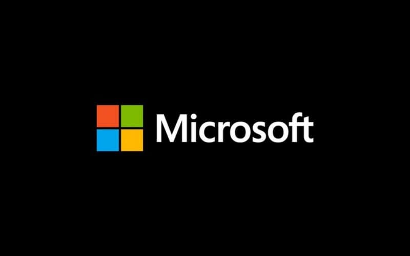 microsoft logo over dark background