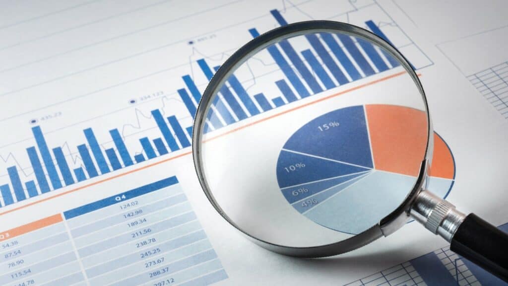 finacial graphs under magnifying glass.