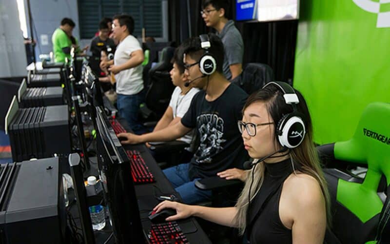 young chinese people playing video games