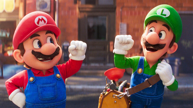 Animated Mario and Luigi are giving fist bumps.