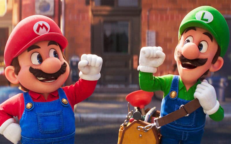 Animated Mario and Luigi are giving fist bumps.