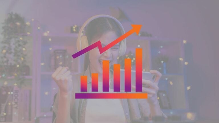 increasing trend graph over the photo of a mobile gamer.