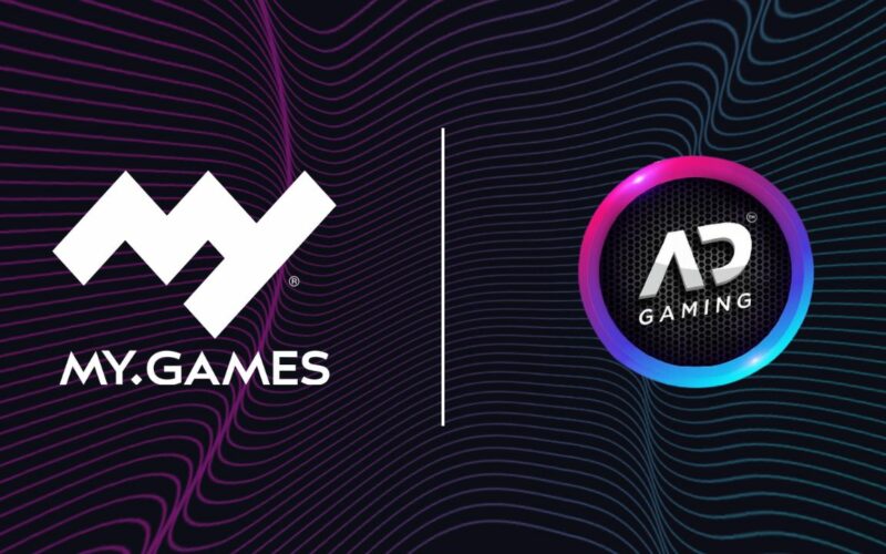 my.games and adgaming logo over dark background.