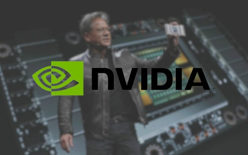 nvidia ceo Jensen Huang with a graphics card in his hand.