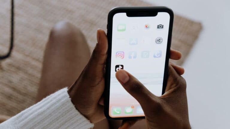 phone with apps on the screen facebook twitter tiktok instagram