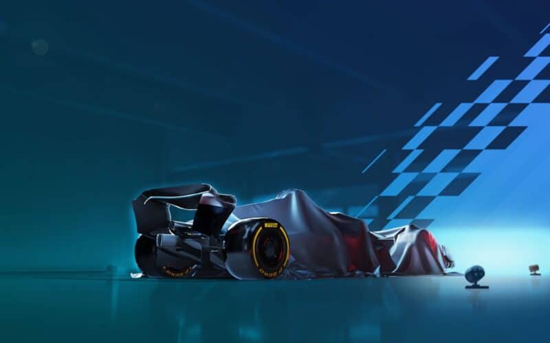 formula 1 car in a dimly lighted room.