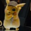 pikachu holding a magnifier