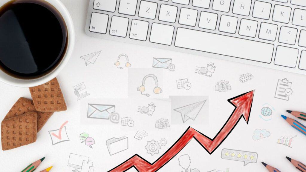 header image for the article, "How to use ad creatives effectively to increase budget efficiency" featuring a bird's-eye view of a desk.