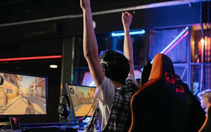 man playing a game on pc