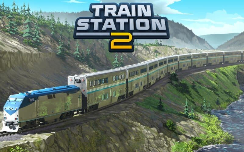 The TrainStation 2 game cover art shows a large train riding through a mountain area, with the TrainStation 2 Logo on top of the image.