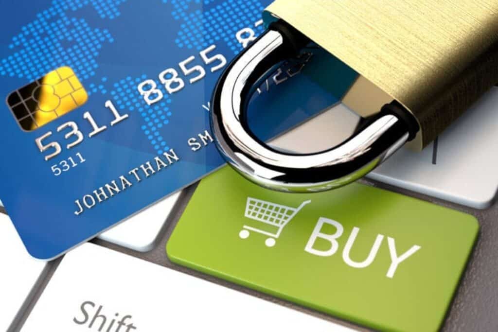 a lock, a credit card and a buy button used for showcasing online gaming transactions