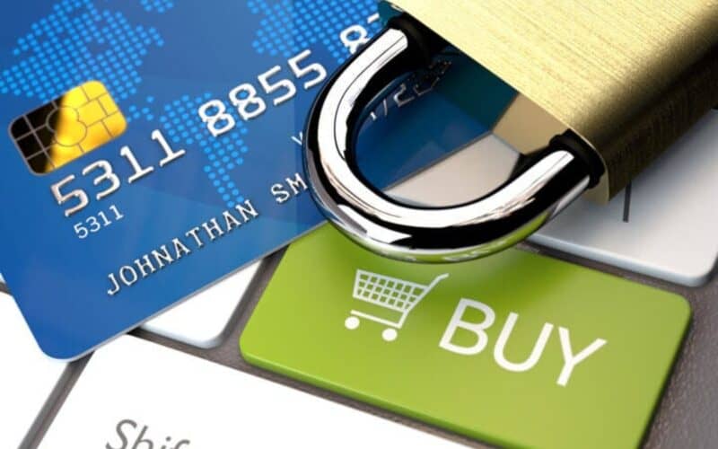 a lock, a credit card and a buy button used for showcasing online gaming transactions