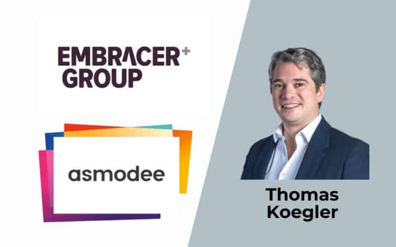 embracer group logo on the left, bottom of that is the asmodee logo, on the right side there is the picture of thomas koegler