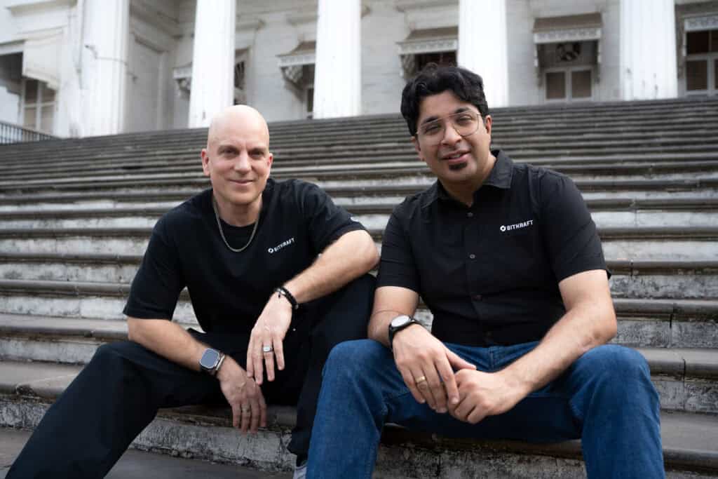 picture of Anuj Tandon and Jens Hilgers sitting on stairs