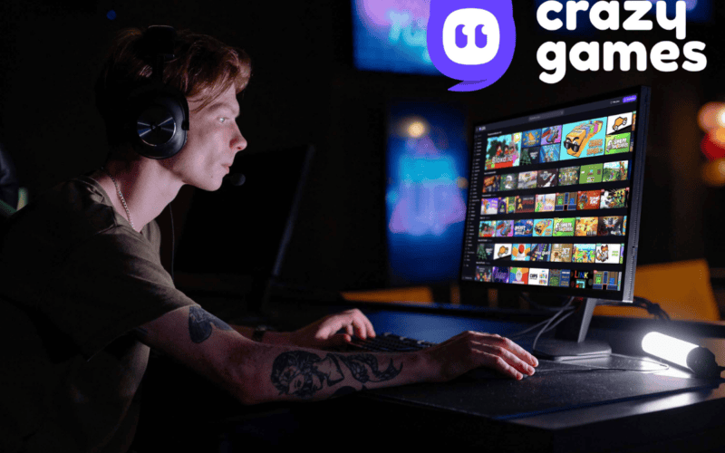 a young adult male playing games on crazygames website, crazygames logo is on top right side