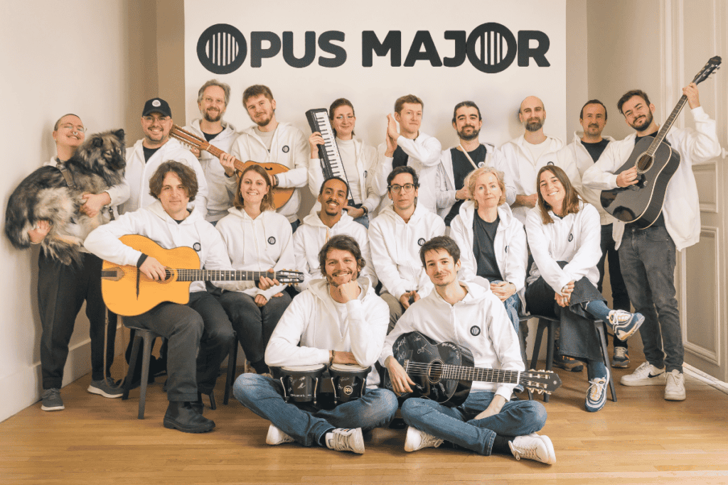 opus major team photo, around 20 people and a dog
