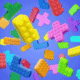 Color Block Jam image shows tetris like lego pieces floating over in an abstract area
