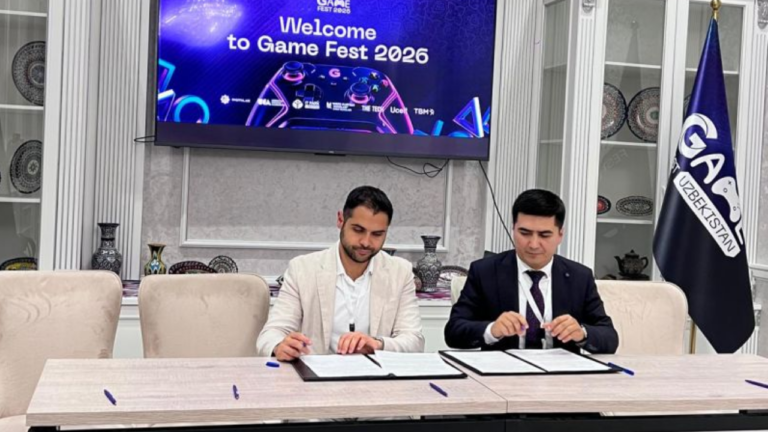 Batuhan Avucan and Abduvali Khaydarov signing memorandum photo