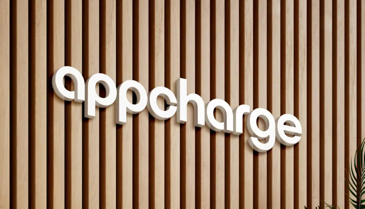 Appcharge headquarters logo displayed on an office wall