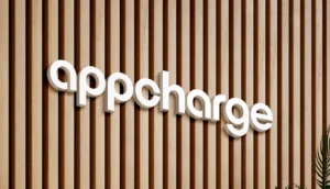 Appcharge headquarters logo displayed on an office wall